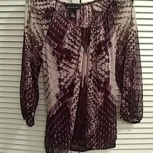 Ladies size medium with under pinning Python print